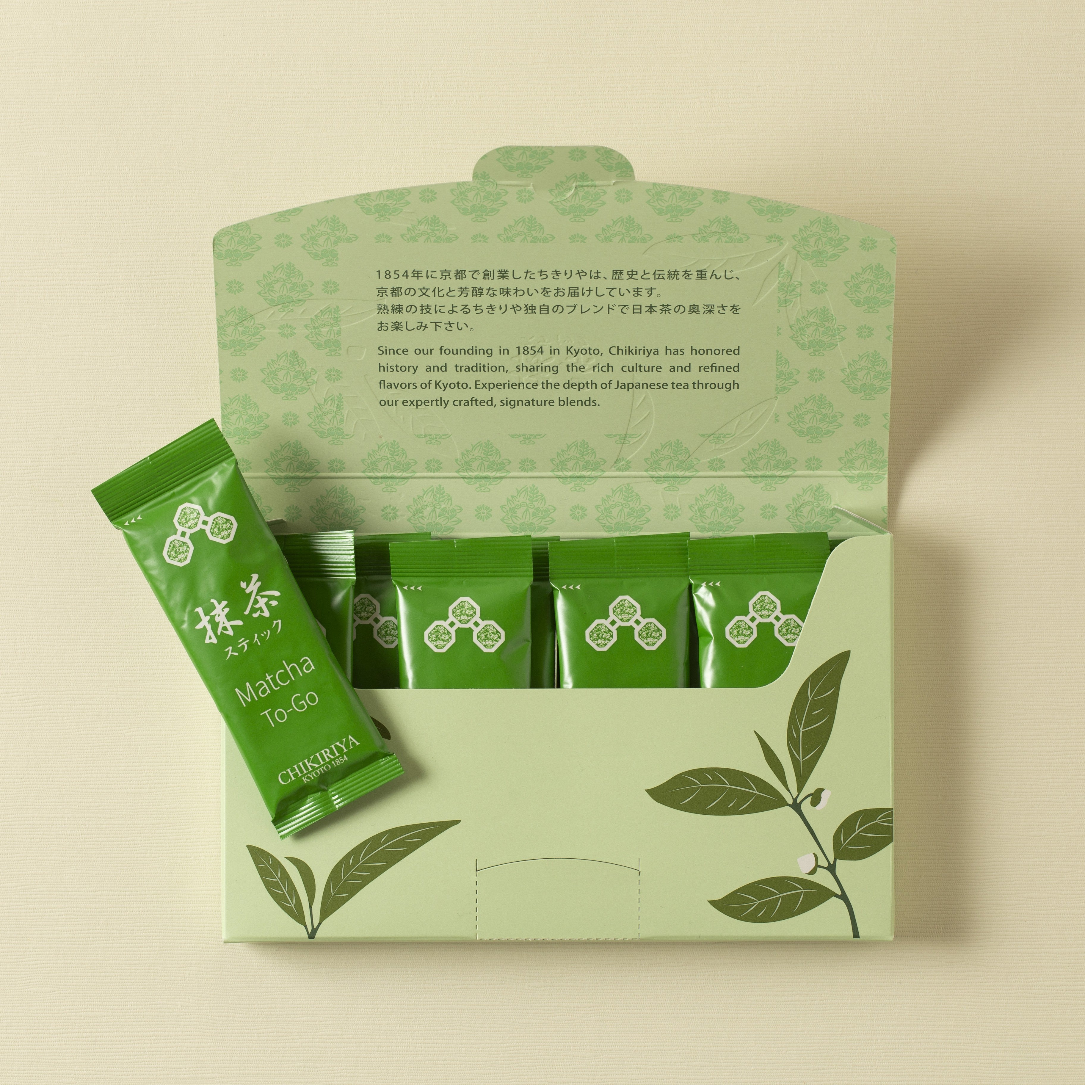 Matcha sticks box open and 10 sticks inside