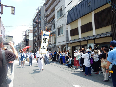 Chikiriya Tea House - Gion matsuri parade in front of Chikiriya Tea Shop