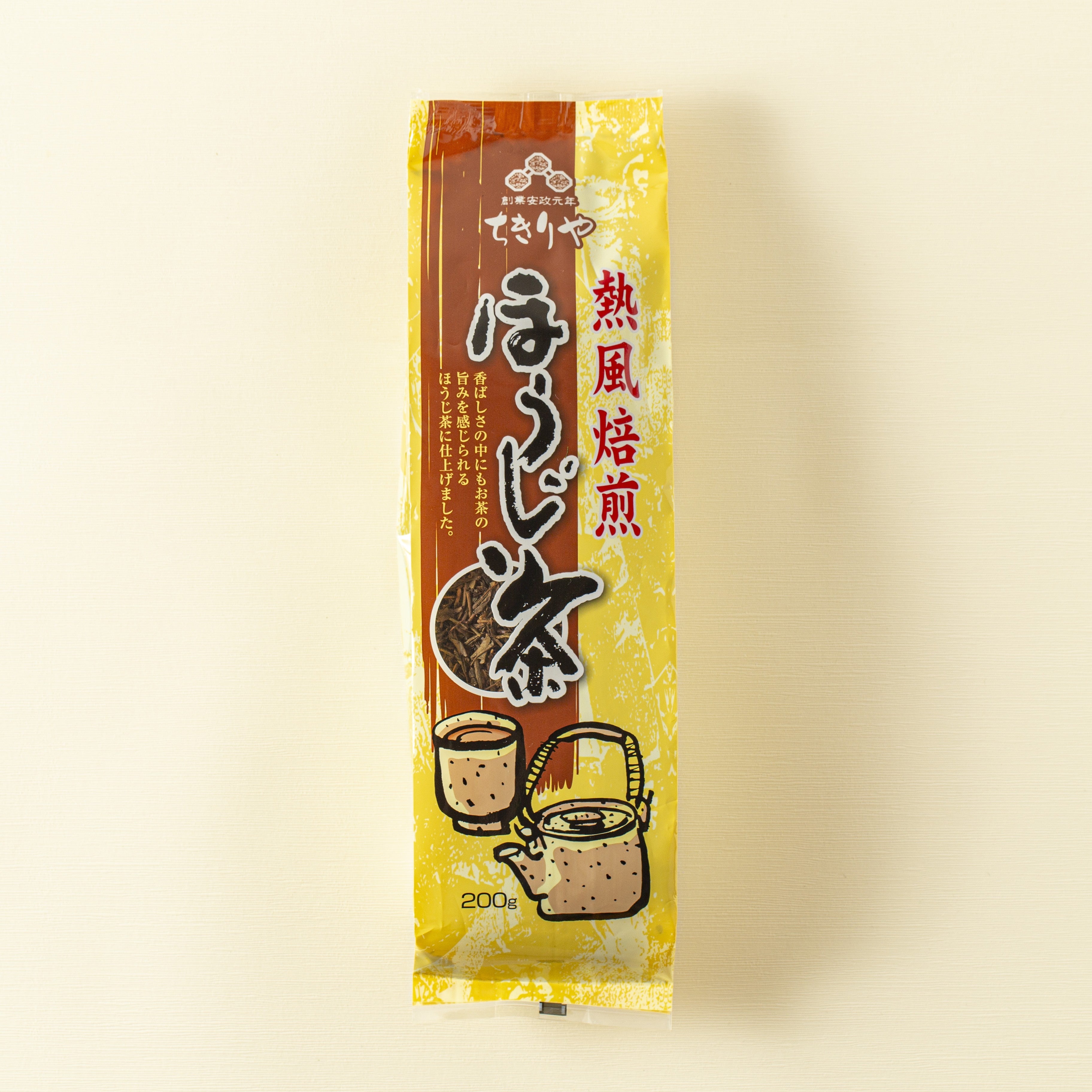 Tea package with Japanese text on a beige background