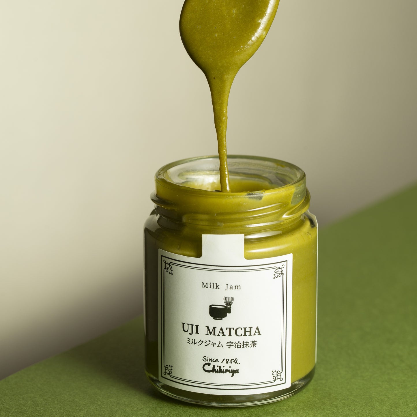 Matcha Milk Jam Spread on a spoon, delicious