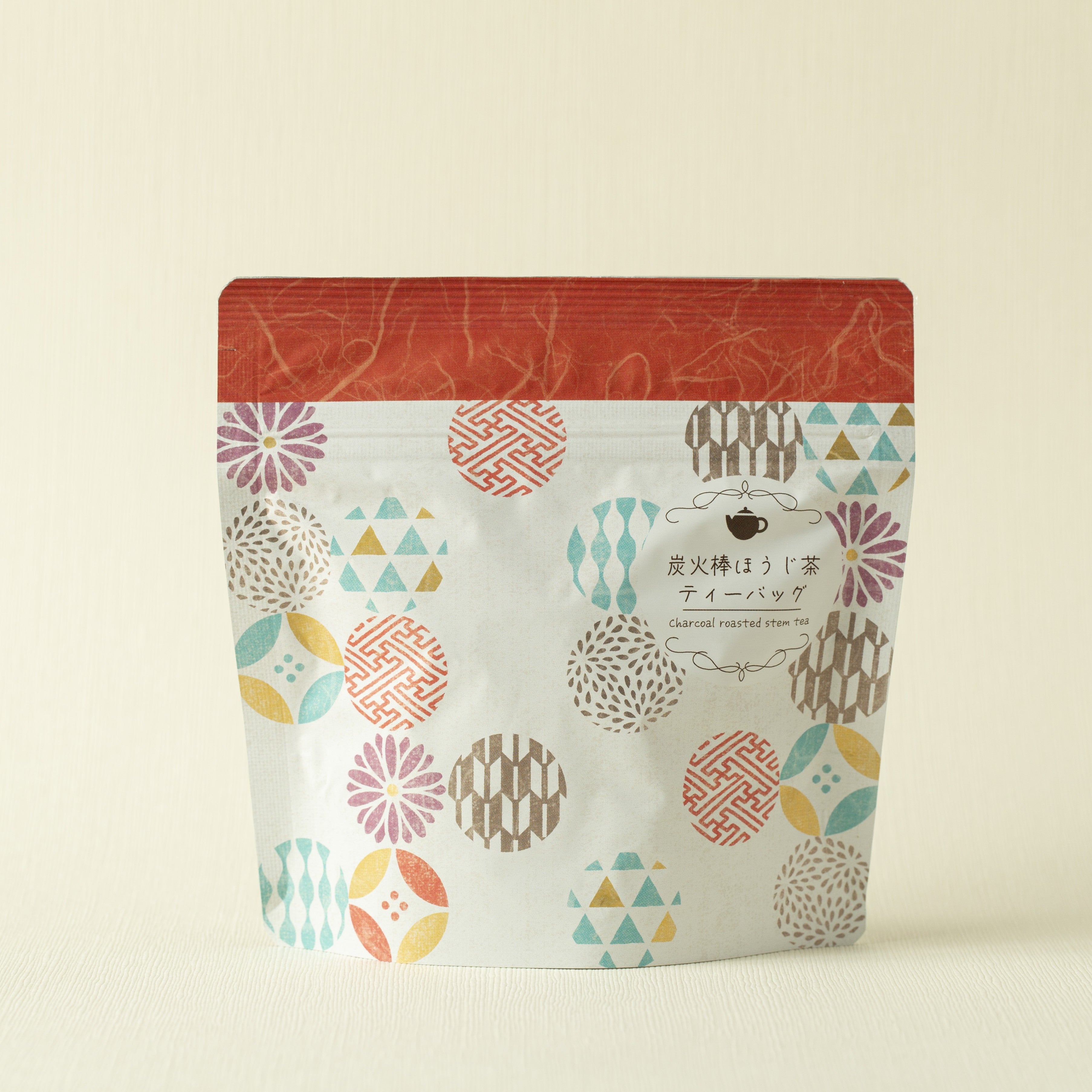 Tea package with geometric pattern on a beige background